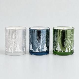 Trio de bougies parfumées Aube givrée éteintes, argent, bleu nuit et vert sapin